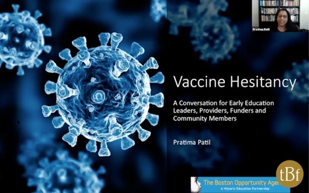 A black and blue photo of the coronavirus; white text on the right says "Vaccine Hestitancy"